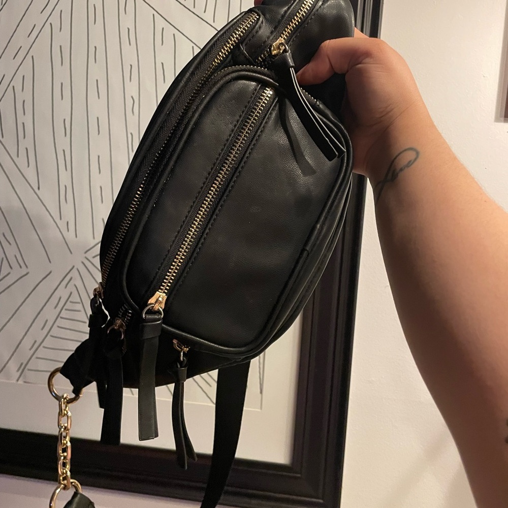 Black Leather Backpack with Gold Accents